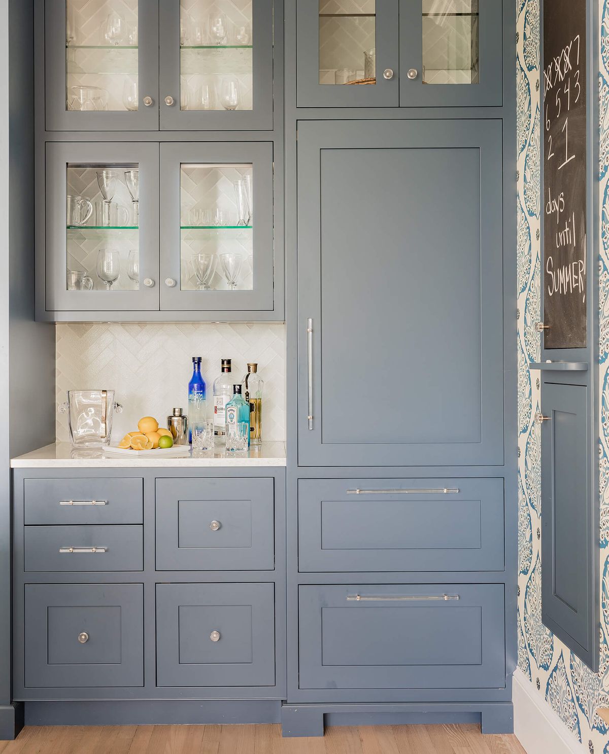 Drinks bar with blue cabinetry