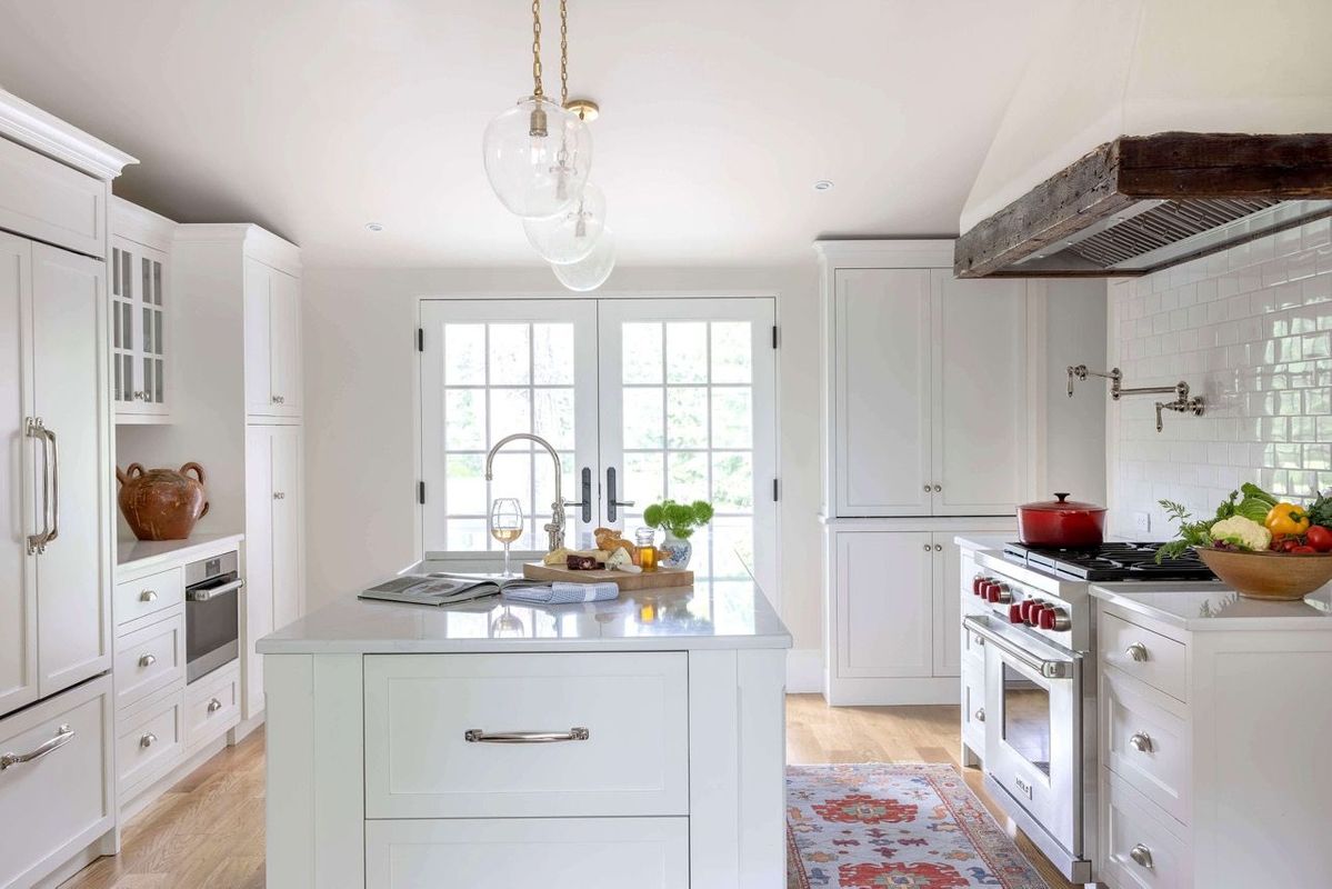 White kitchen in antique colonial home