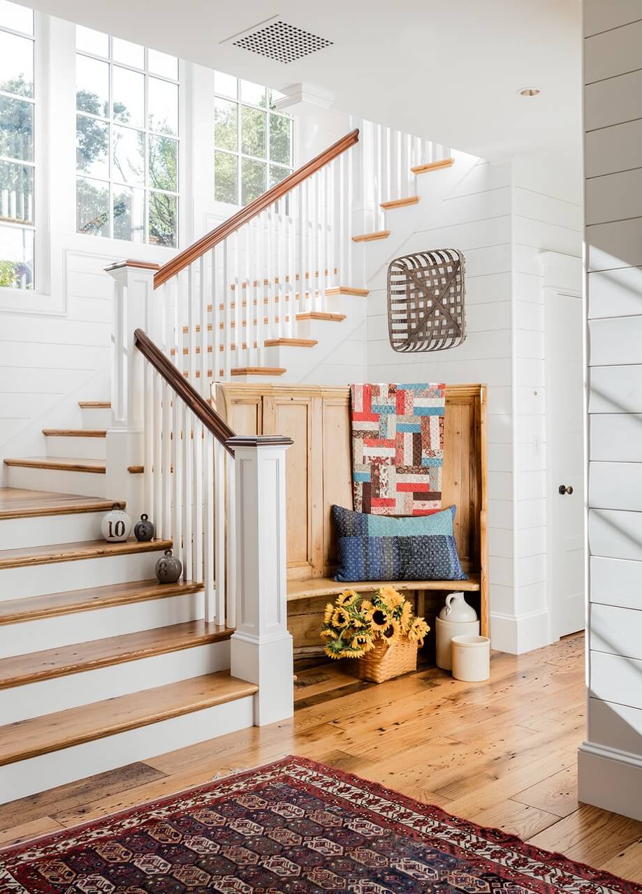 Wood bench at base of back stairs