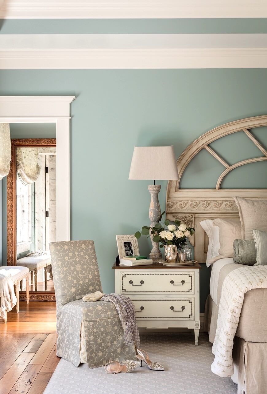 Primary bedroom detail with slipper chair
