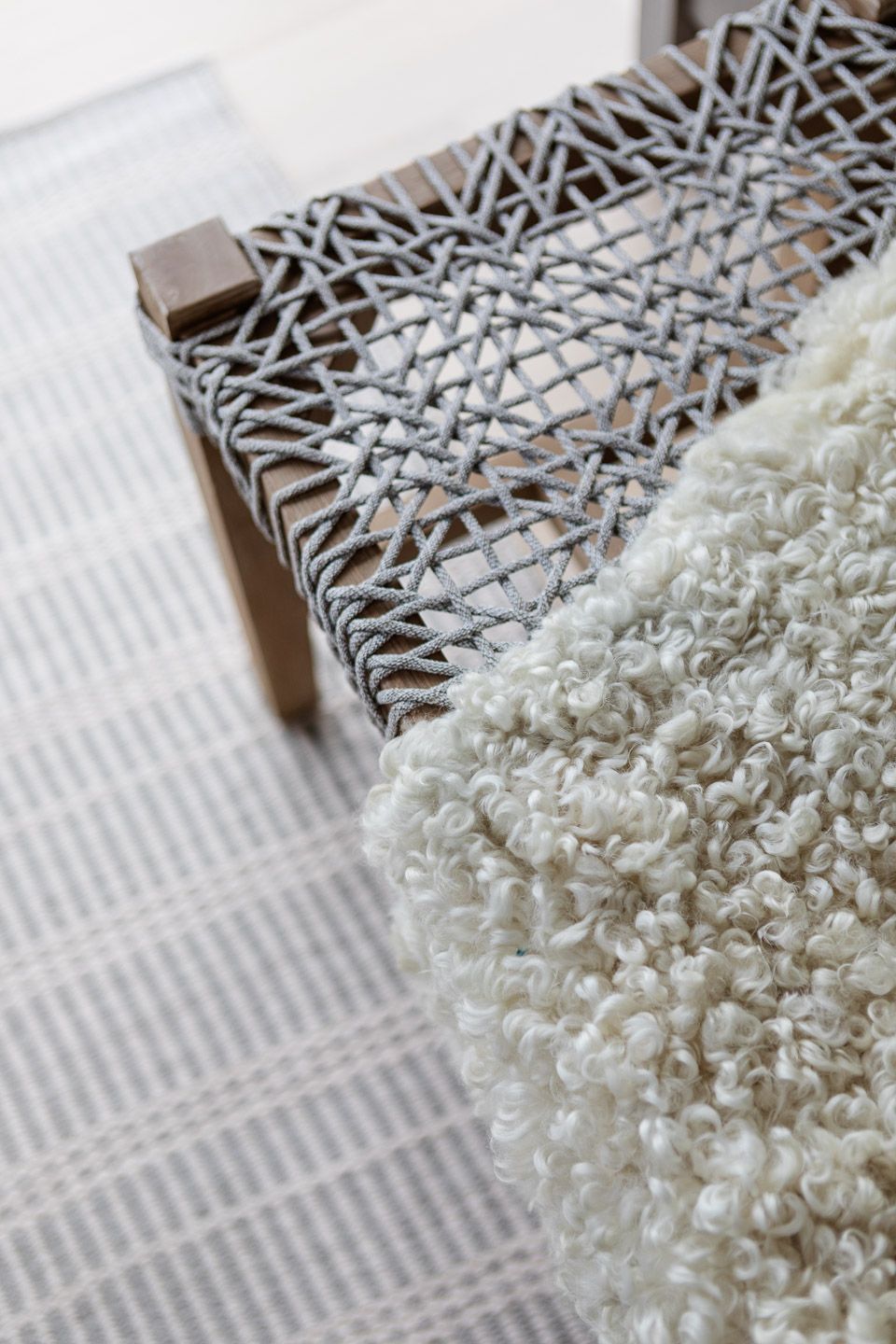 Detail of textures layered at bedroom bench