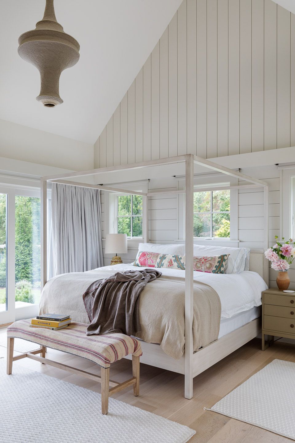 Primary bedroom with custom four poster bed