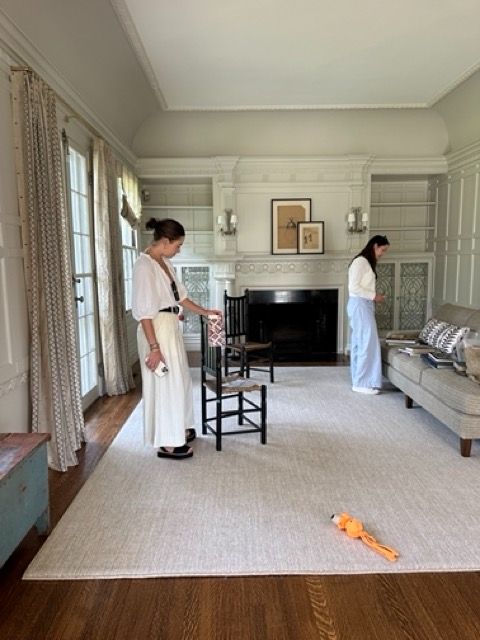 Installing furniture in the Back Parlor