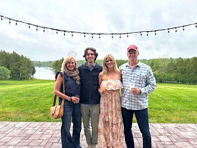 Family poses for photo on patio-1