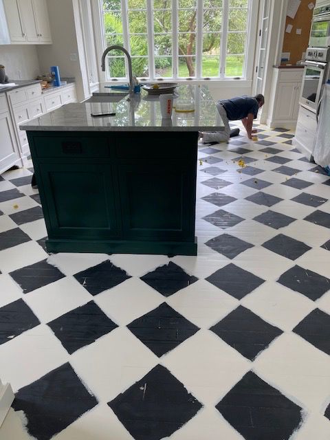 work in progress black and white tile floor