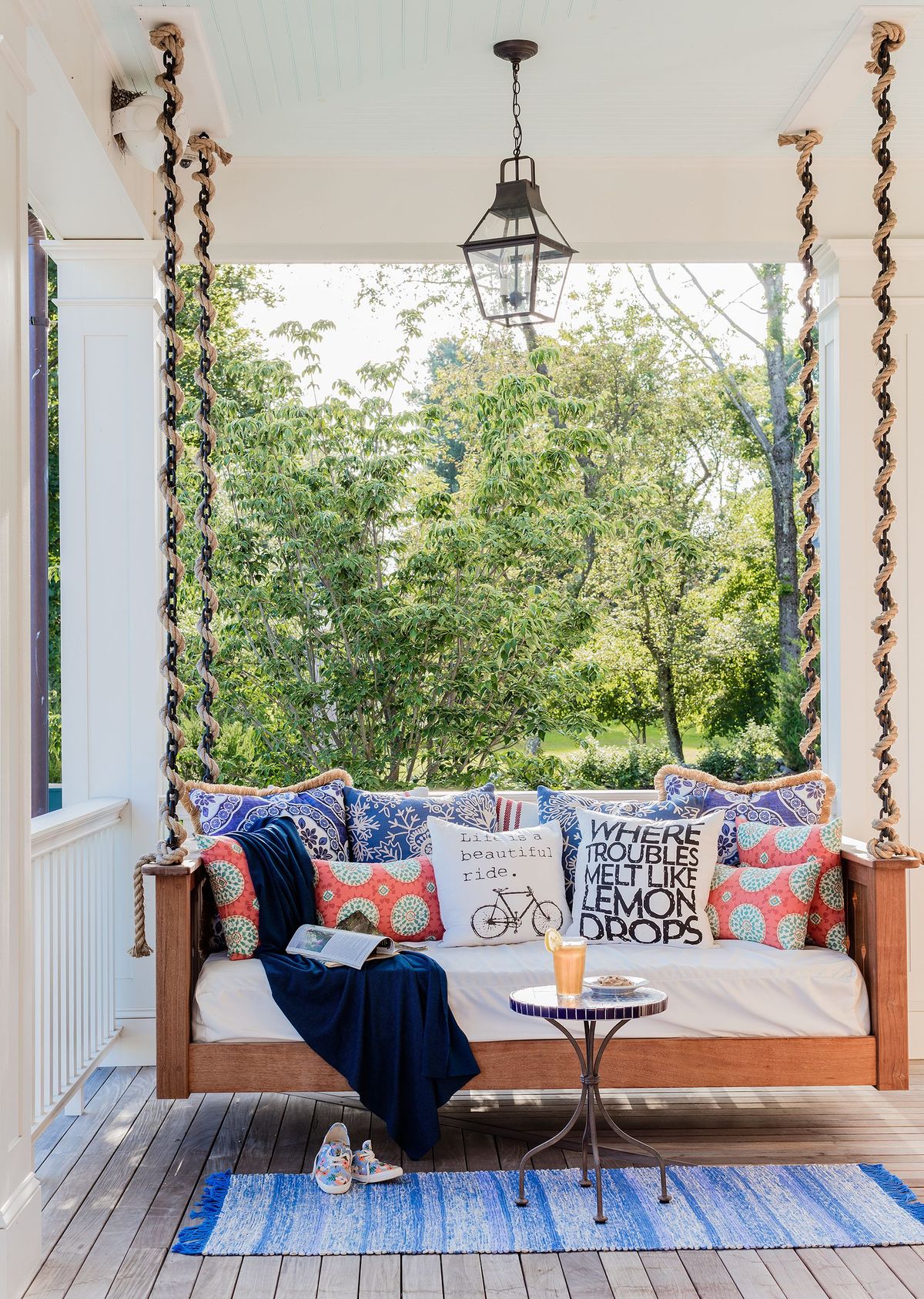23 Northshore Farmhouse Exterior Porch Swing photo by Michael J. Lee