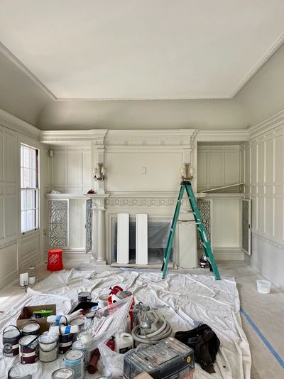 Back parlor with painting in progress