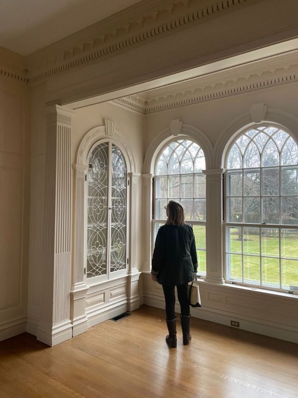 Woman looking at moulding details