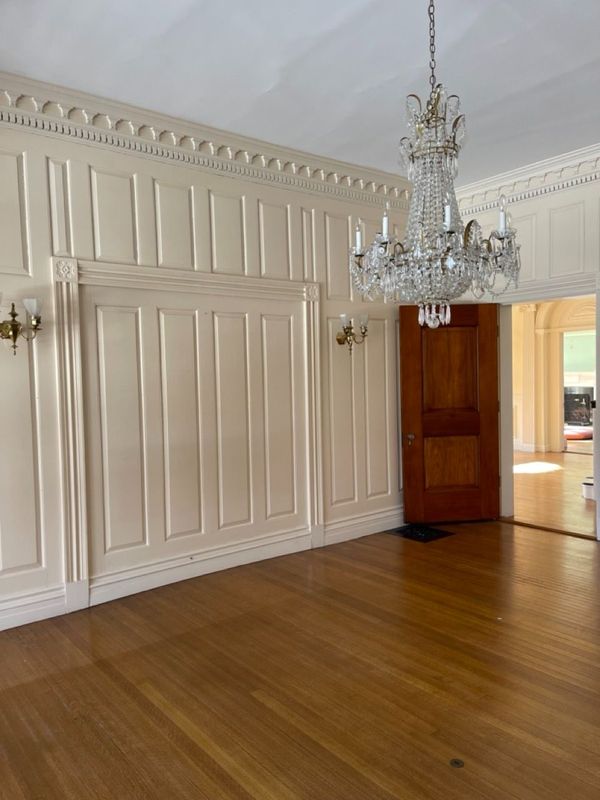 Pocket door opening blocked off and paneled over