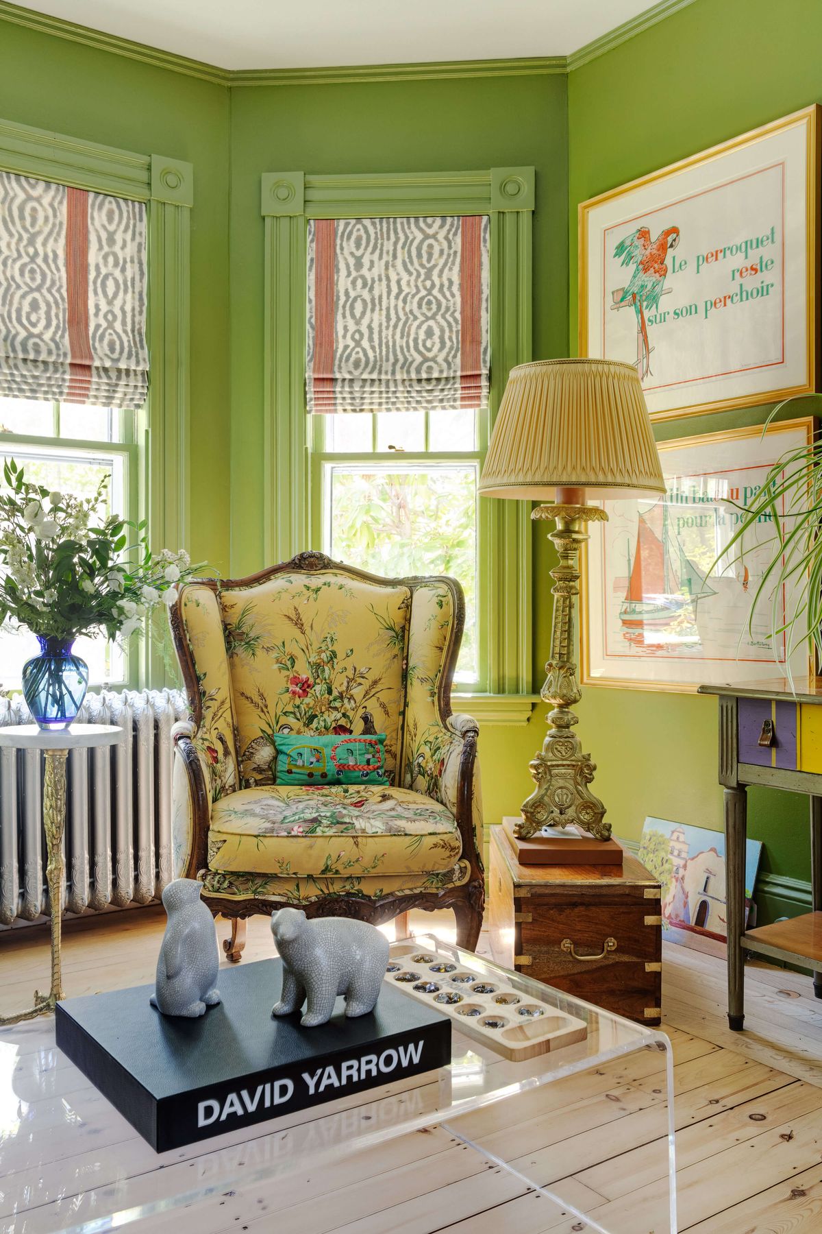 Living Room with French antique armchair and brass lamp