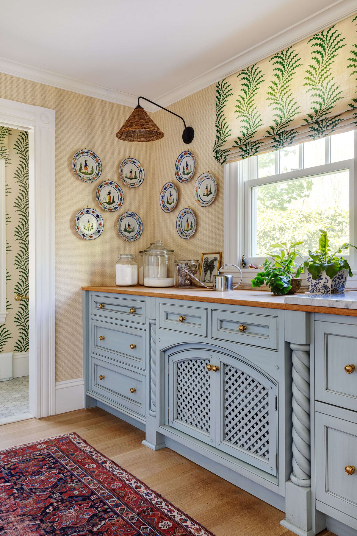 Butlers Pantry with antique plates on wall
