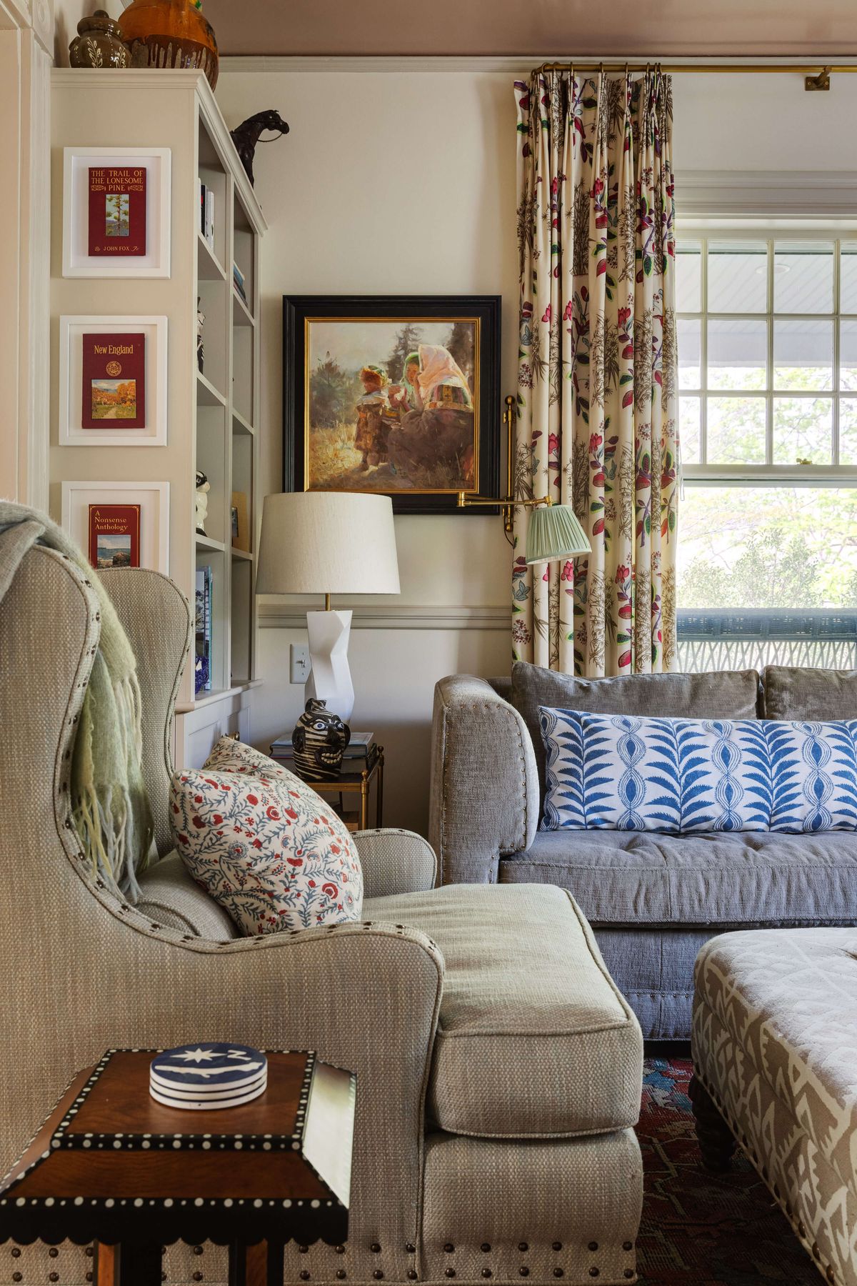 Wing chair and sofa with colorful textiles
